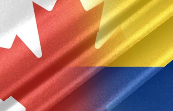 The flags of Colombia and Canada merging together to represent Immigration